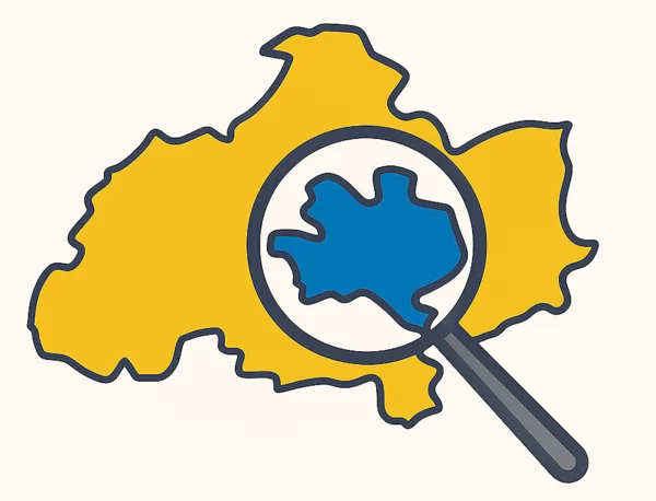 Der Umriss der Stadt Kaiserslautern wird von einer Lupe näher betrachtet.